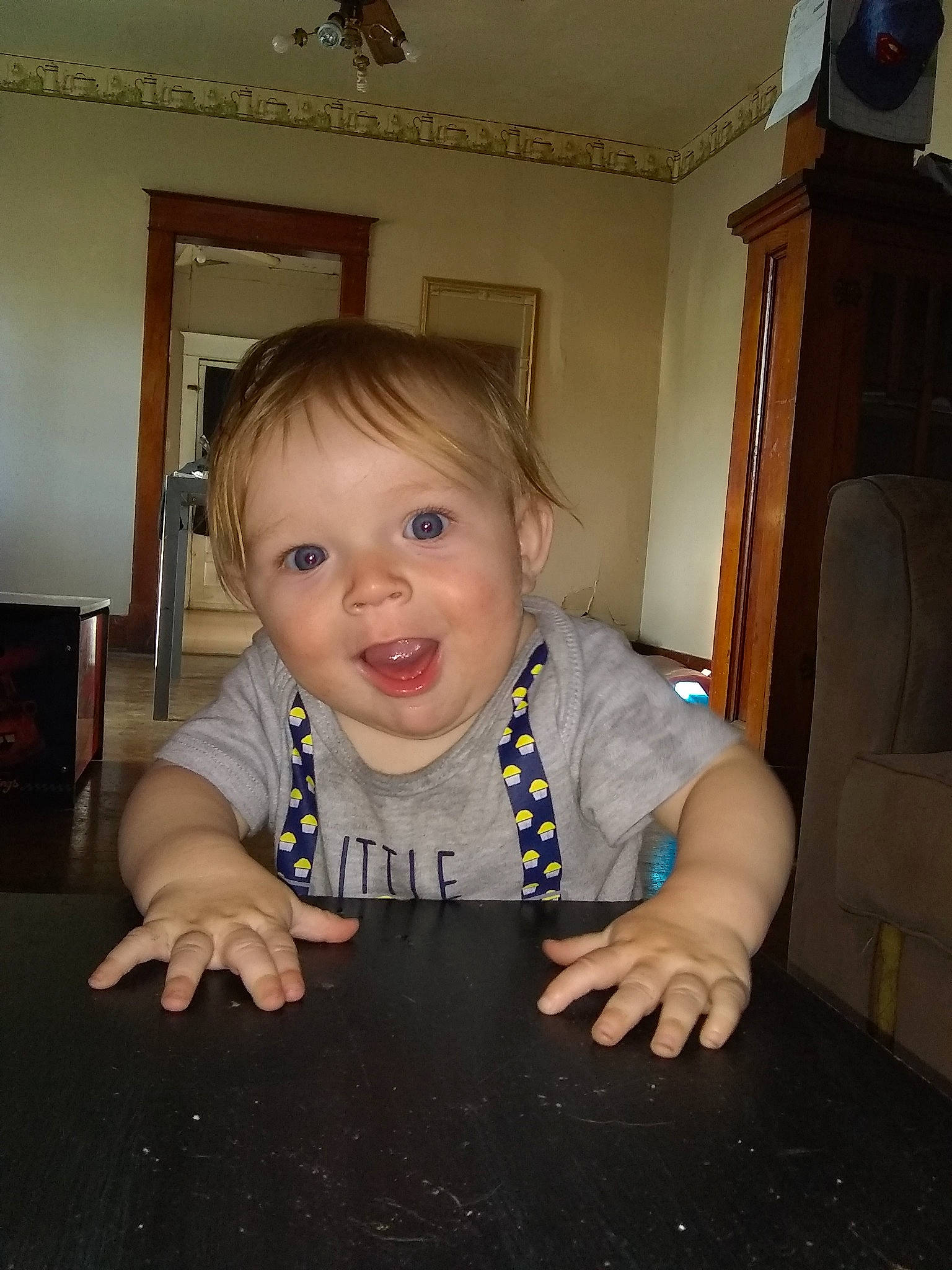 Konnor is registered to the contest to win money with this photo: baby, cheek, child, crawling, eye, face, finger, fun, head, iris, nose, person, sitting, skin, smile, toddler