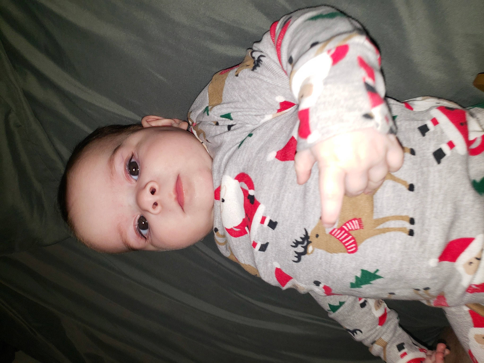 Esperanza is registered to the contest to win money with this photo: baby, baby_toddler_clothing, carmine, cheek, child, comfort, flash_photography, grass, human_body, pattern, person, portrait_photography, sitting, skin, sleeve, toddler, vertebrate, wood