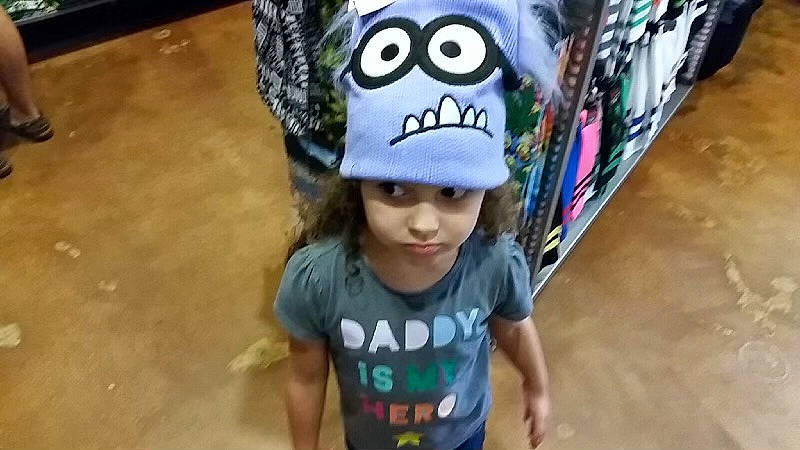 Olivia joined the competition — help win amazing prizes! baseball_cap, beanie, cap, child, cool, electric_blue, eyewear, fashion_accessory, font, fun, fur, happy, headgear, headwear, leisure, person, personal_protective_equipment, recreation, sleeve, t_shirt