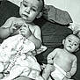 baby, babies, blanket, beads, clip, couch, diaper, face, infant, monochrome, person, portrait, relaxing, sitting, soft_texture, toddler, two_children, young, indoor, curious
