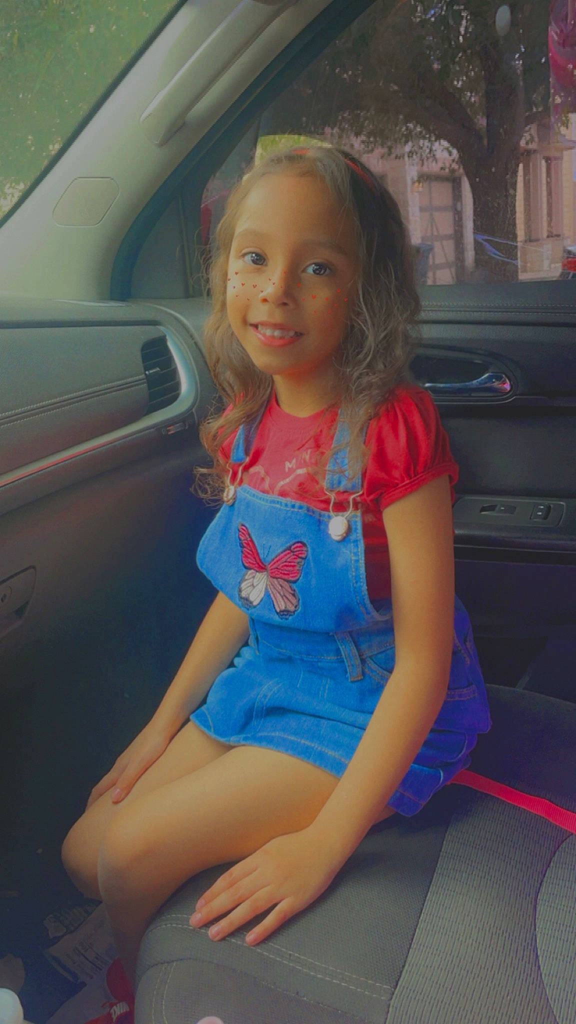 Emma is registered to the contest to win money with this photo: auto_part, automotive_design, automotive_exterior, car, car_seat, dress, electric_blue, face, hair, joy, leg, long_hair, motor_vehicle, person, smile, steering_wheel, thigh, tints_and_shades, trunk, vehicle