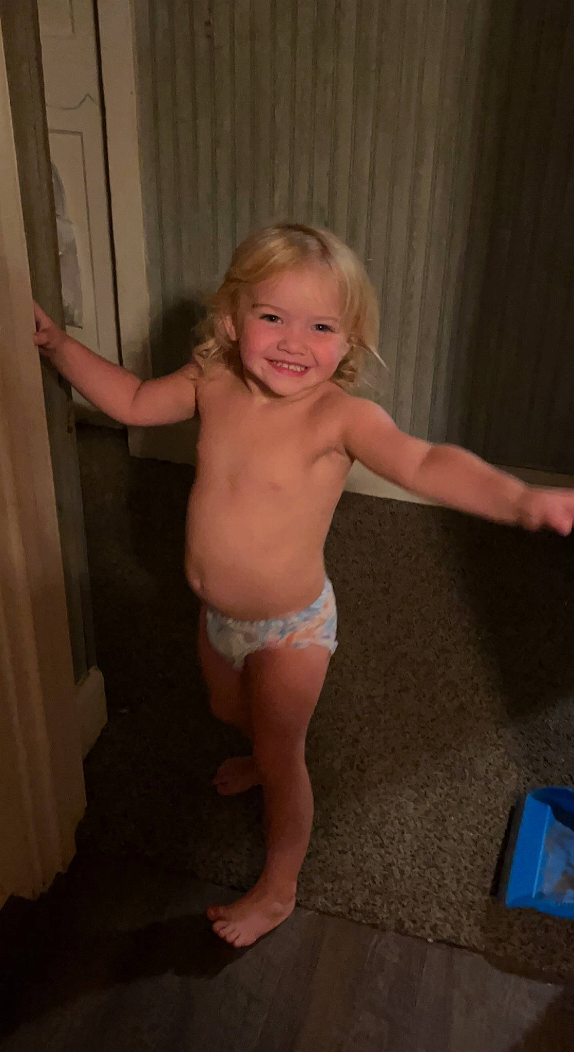 Braylee is registered to the contest to win money with this photo: barefoot, chest, elbow, finger, floor, flooring, human_body, joint, joy, knee, leg, mouth, muscle, person, shorts, shoulder, smile, standing, stomach, thigh