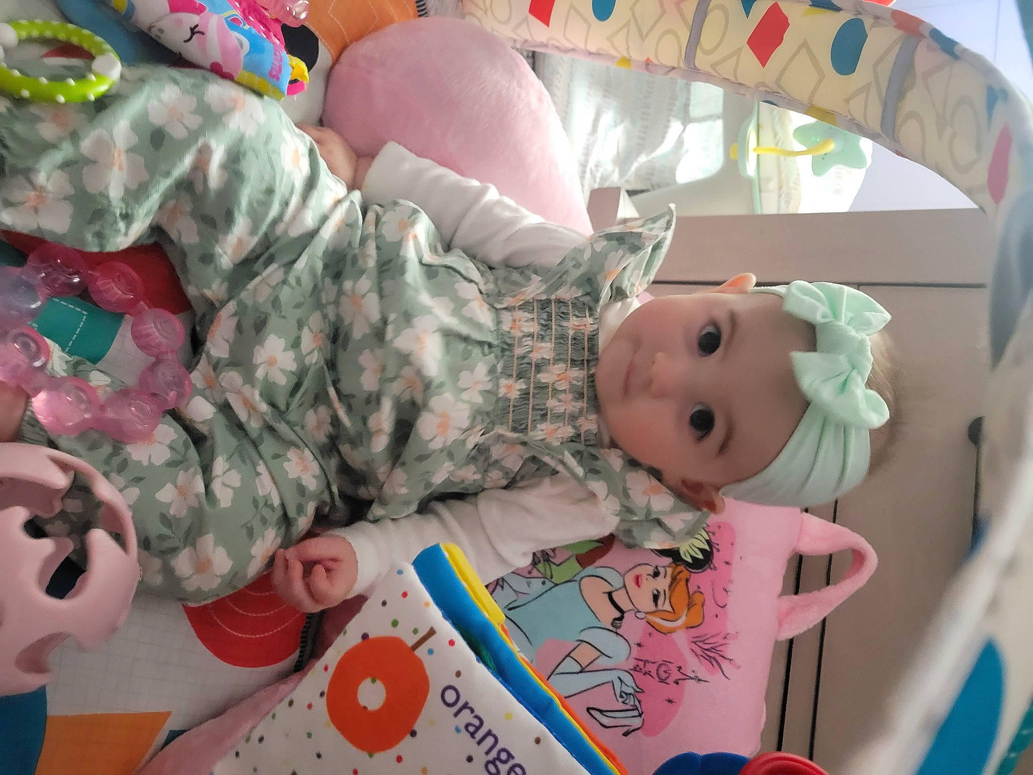 Taylor joined the competition — help win amazing prizes! baby, baby_products, baby_toddler_clothing, baby_toys, beauty, camouflage, child, comfort, facial_expression, fun, headwear, military_camouflage, pattern, people, person, pink, play, room, sleeve, textile