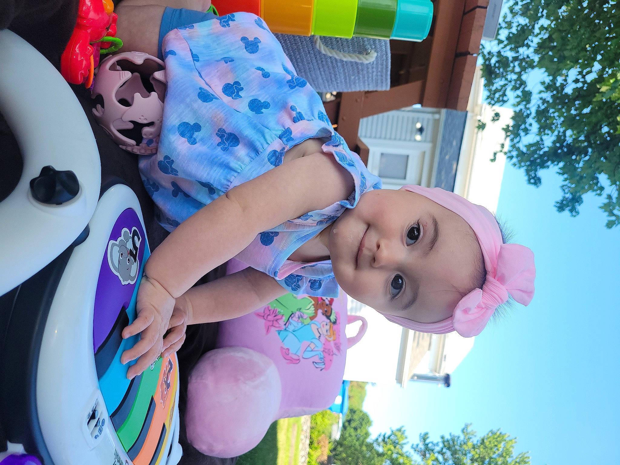 Taylor is registered to the contest to win money with this photo: baby_products, balloon, child, event, fun, grass, happy, joy, leisure, party_supply, person, pink, plant, play, product, purple, recreation, sky, smile, toddler