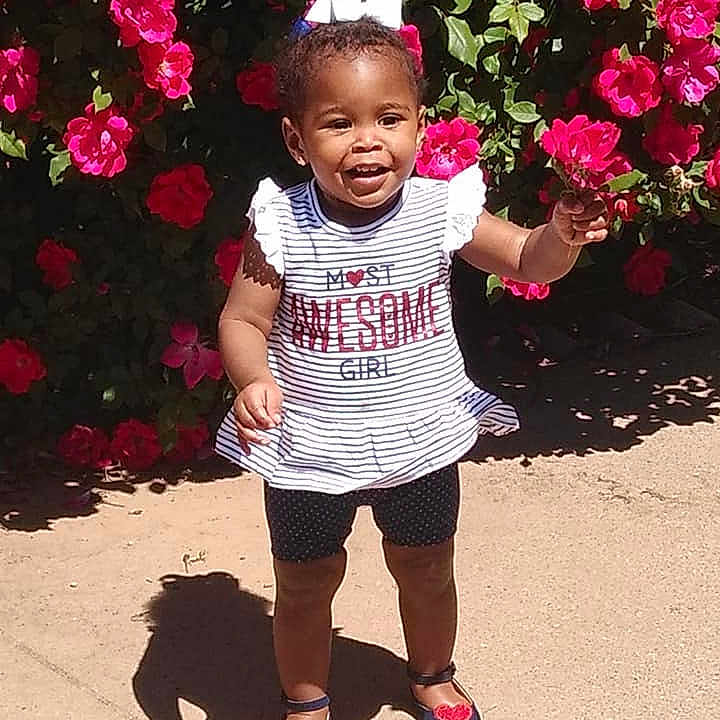 Ny'Asia is registered to the contest to win money with this photo: baby, child, dress, family, flower, footwear, happy, people, person, petal, pink, plant, play, shoe, smile, summer, t_shirt, toddler, vacation