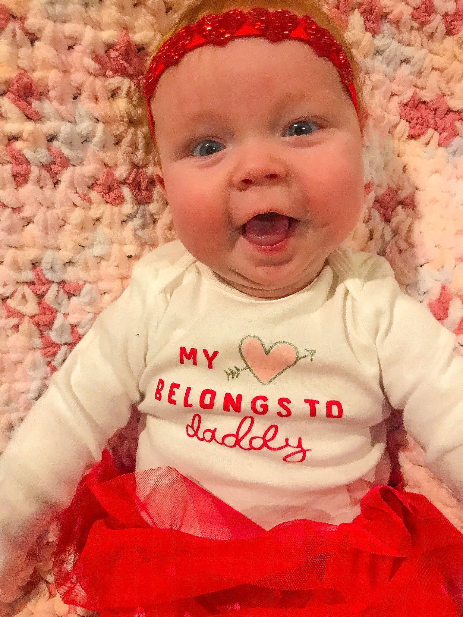 Baylor joined the competition — help win amazing prizes! baby, baby_laughing, baby_toddler_clothing, cheek, child, chin, clothing, face, happy, headwear, lip, organ, pattern, person, pink, red, skin, sleeve, smile, textile