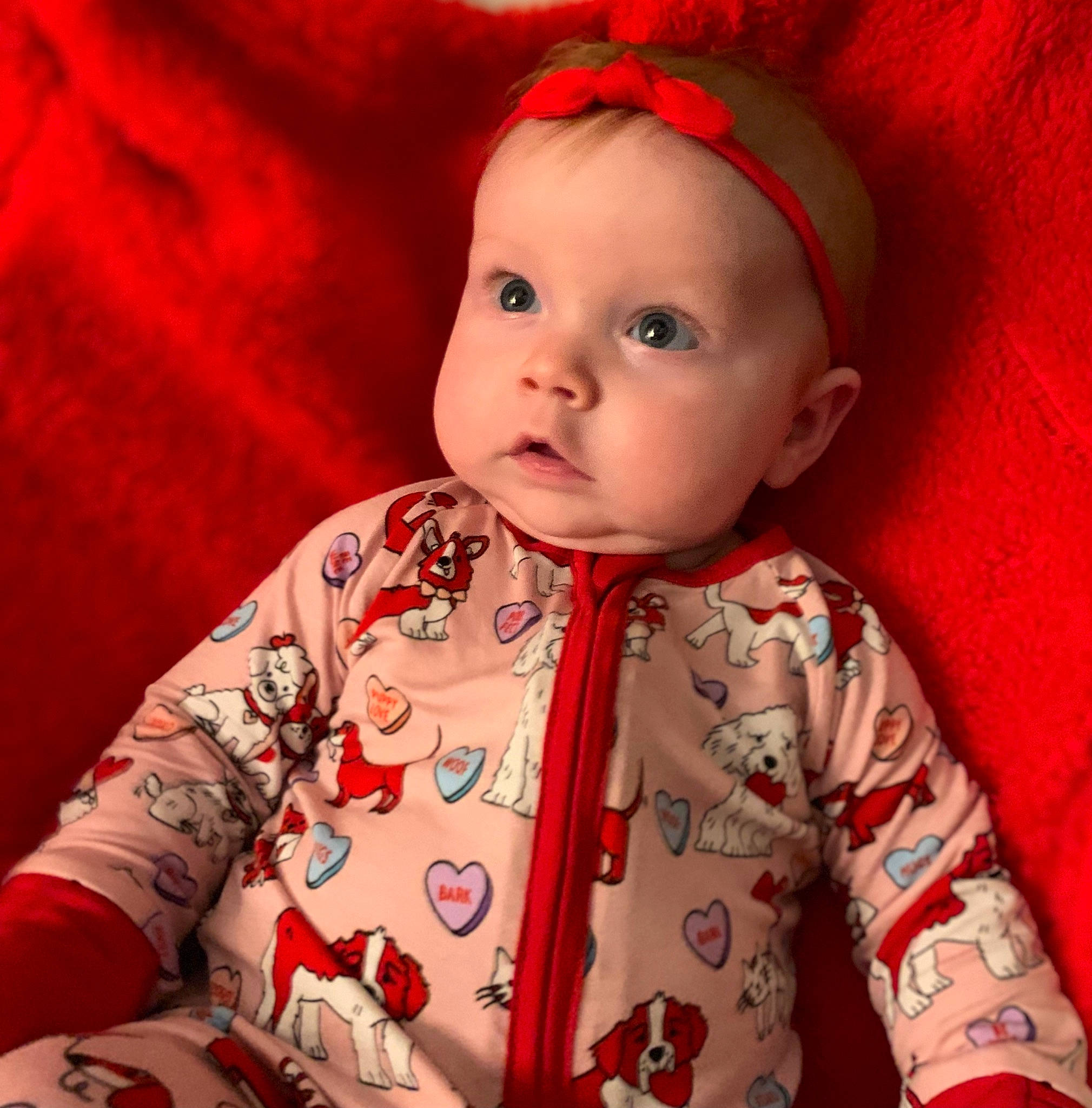 Baylor joined the competition — help win amazing prizes! baby, baby_toddler_clothing, chin, collar, eye, face, happy, head, human_body, iris, lip, neck, nose, outerwear, person, pink, red, skin, sleeve, standing