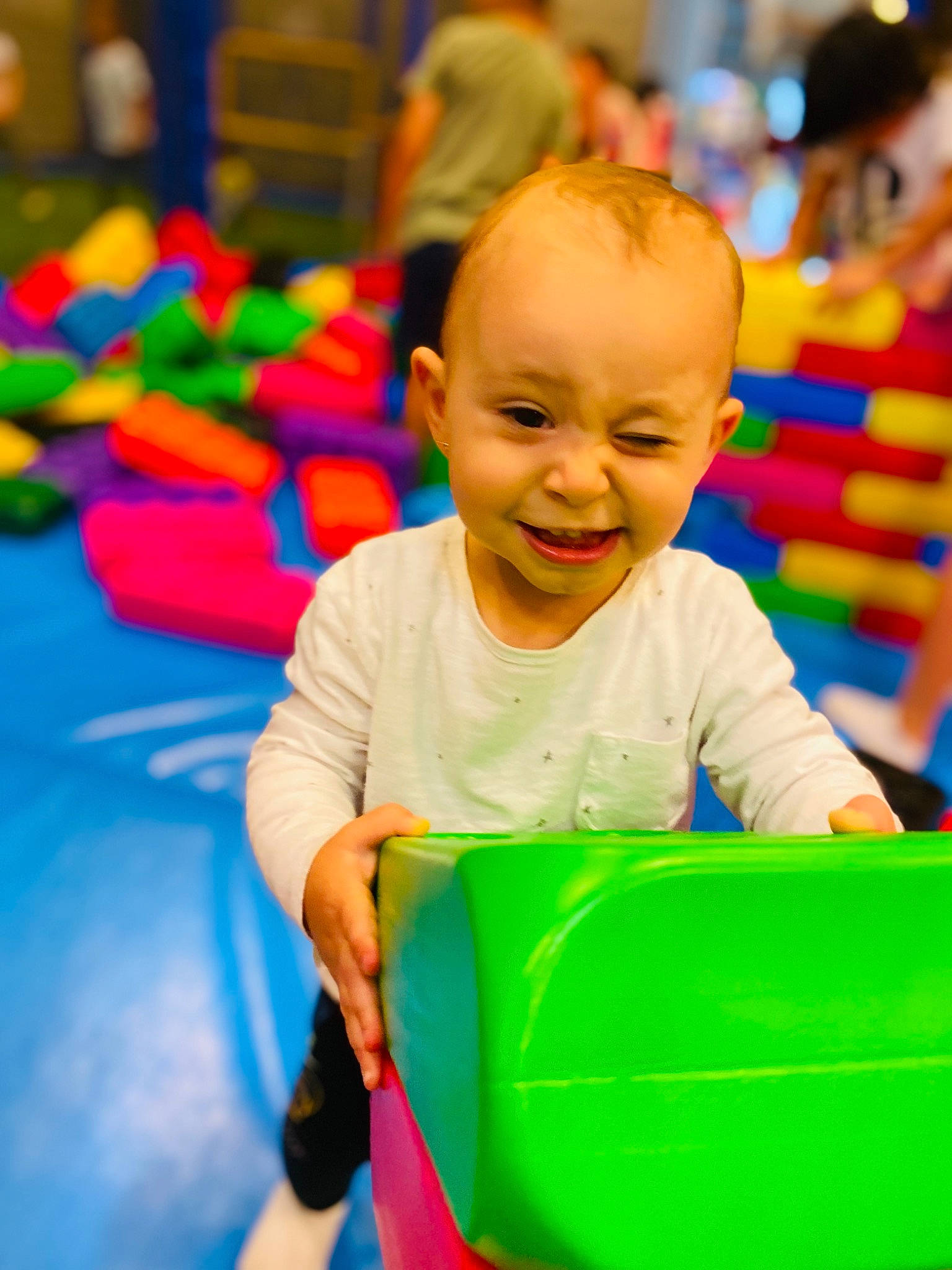 Lorena participe au concours pour gagner de l'argent avec cette photo : baby, baby_playing_with_toys, baby_products, baby_toddler_clothing, child, city, event, fun, happy, kindergarten, leisure, person, play, playground, product, recreation, room, sitting, smile, t_shirt