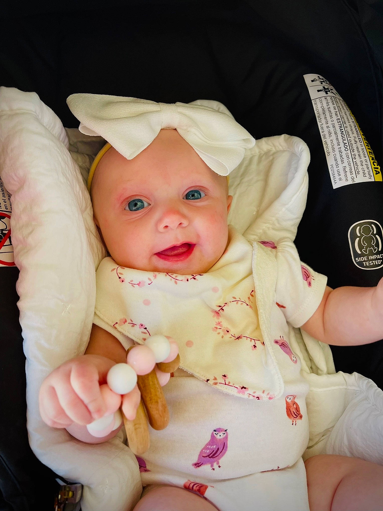 Maesyn is registered to the contest to win money with this photo: arm, baby, baby_toddler_clothing, cheek, comfort, eye, face, finger, gesture, happy, head, headwear, human_body, lip, mouth, person, pink, skin, sleeve, smile