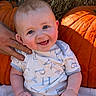 baby, infant, child, smiling, happy, portrait, pumpkin, pumpkin_patch, autumn, fall, hay, outdoor, farm, rustic, onesie, sitting, adult_hand, closeup, orange, family