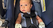 Augustus joined the competition — help win amazing prizes!  안전_harness, baby, car_seat, carriage, child, eyes, face, gray_outfit, head, indoor, infant, mittens, pacifier, photography, portrait, safety_straps, sitting, star_pattern, travel, wide_eyed
