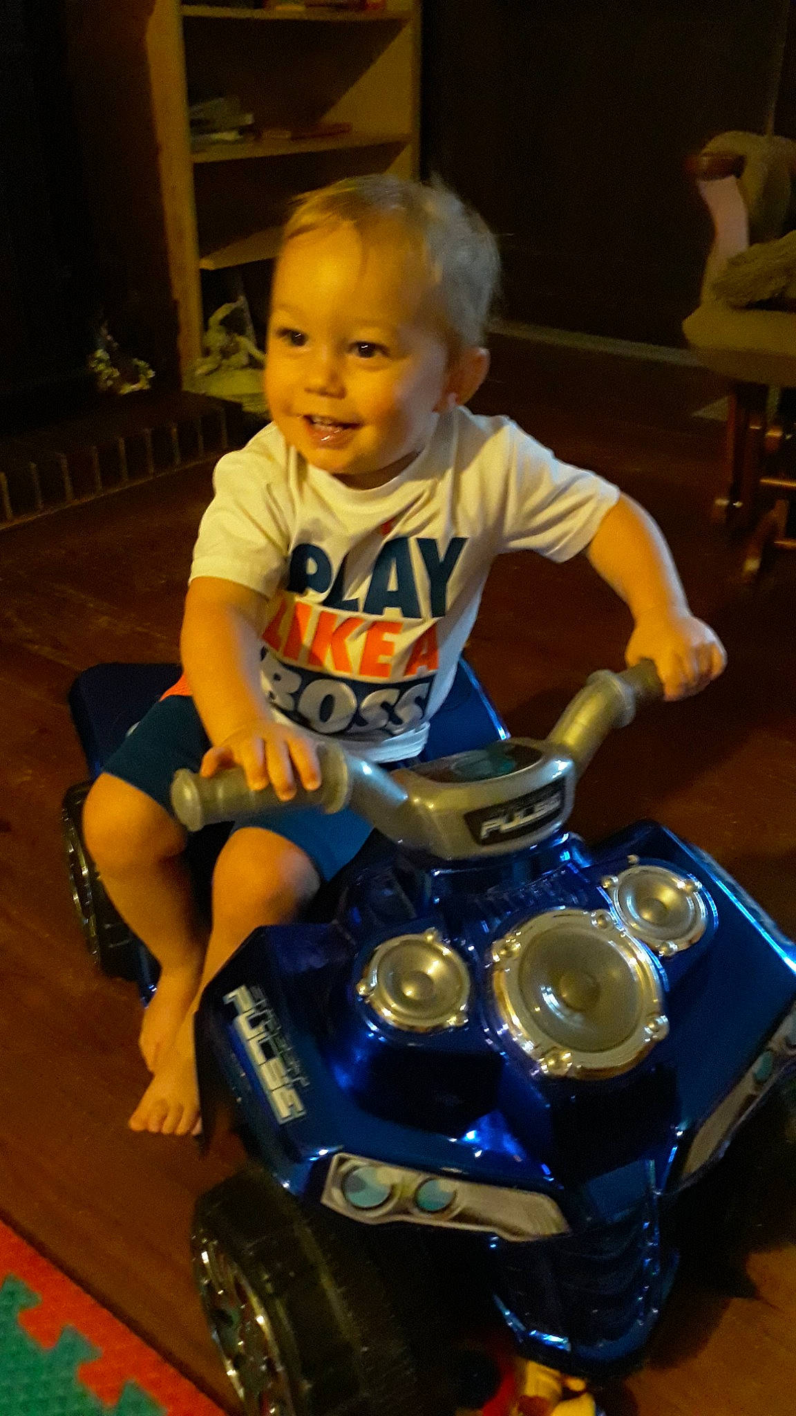 Aires is registered to the contest to win money with this photo: child, headlamp, joy, person, play, toddler, vehicle