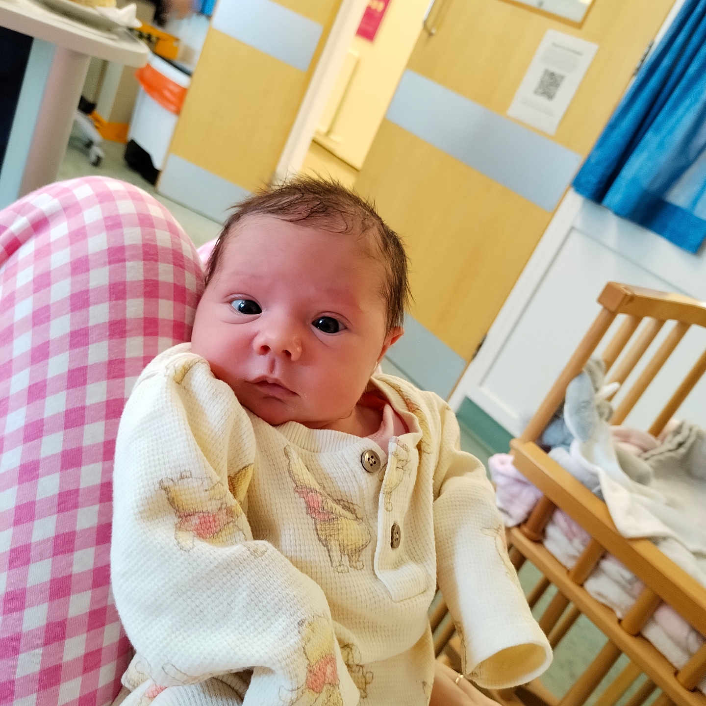 Emie is registered to the contest to win money with this photo: adult, architecture, baby, bed, bread, building, crib, face, female, food, furniture, head, hospital, indoors, infantbed, nursery, person, room, woman, wood