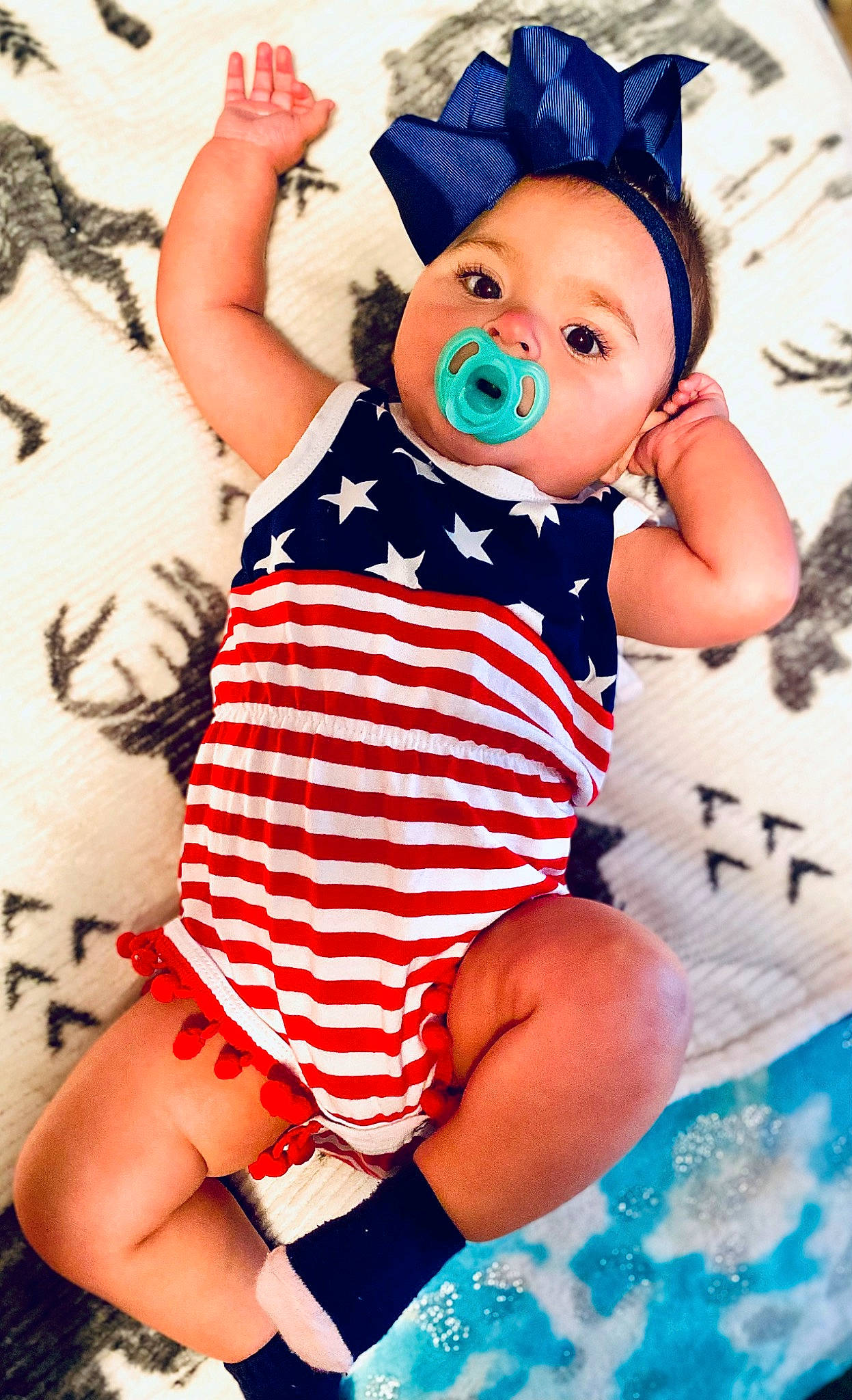Blakeleigh joined the competition — help win amazing prizes! baby_toddler_clothing, blue, child, fun, gesture, happy, hat, human_leg, pattern, person, pink, plush, red, sitting, sleeve, stuffed_toy, thigh, toddler, toy, white