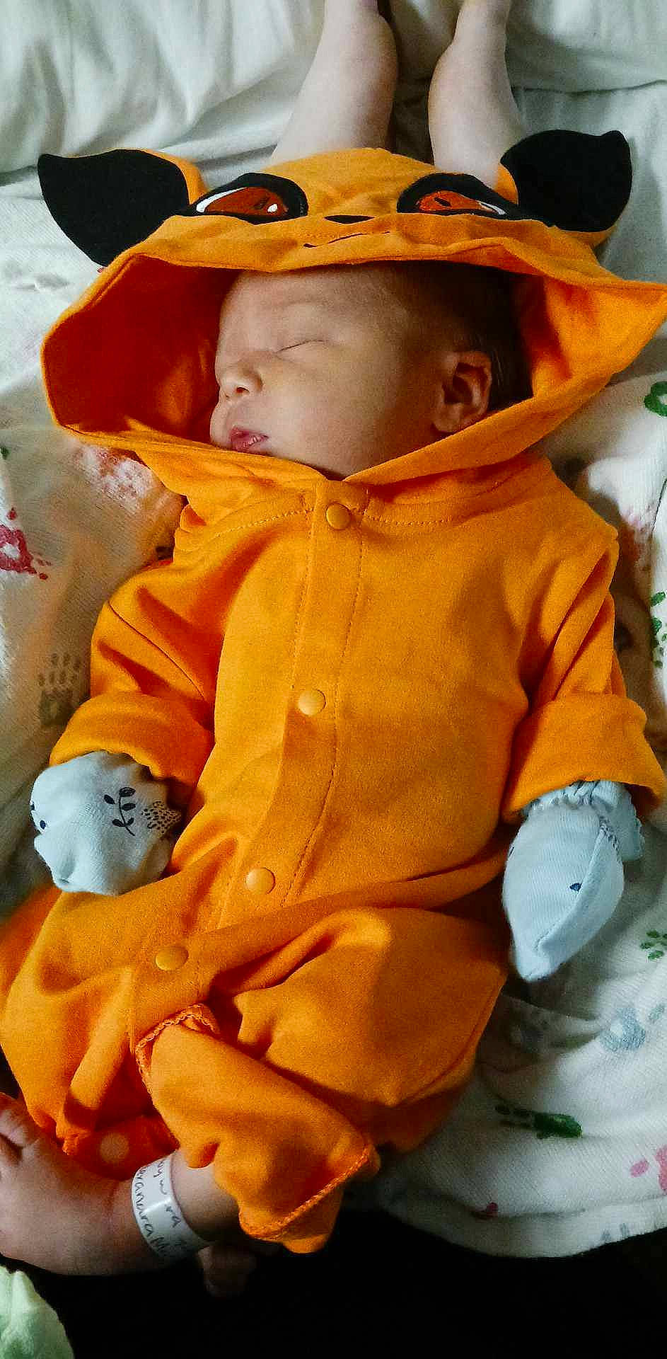 Aloy is registered to the contest to win money with this photo: baby, baby_products, baby_safety, baby_toddler_clothing, cheek, child, comfort, eye, fun, hat, head, jacket, nose, orange, people, person, personal_protective_equipment, skin, sleeve, toddler