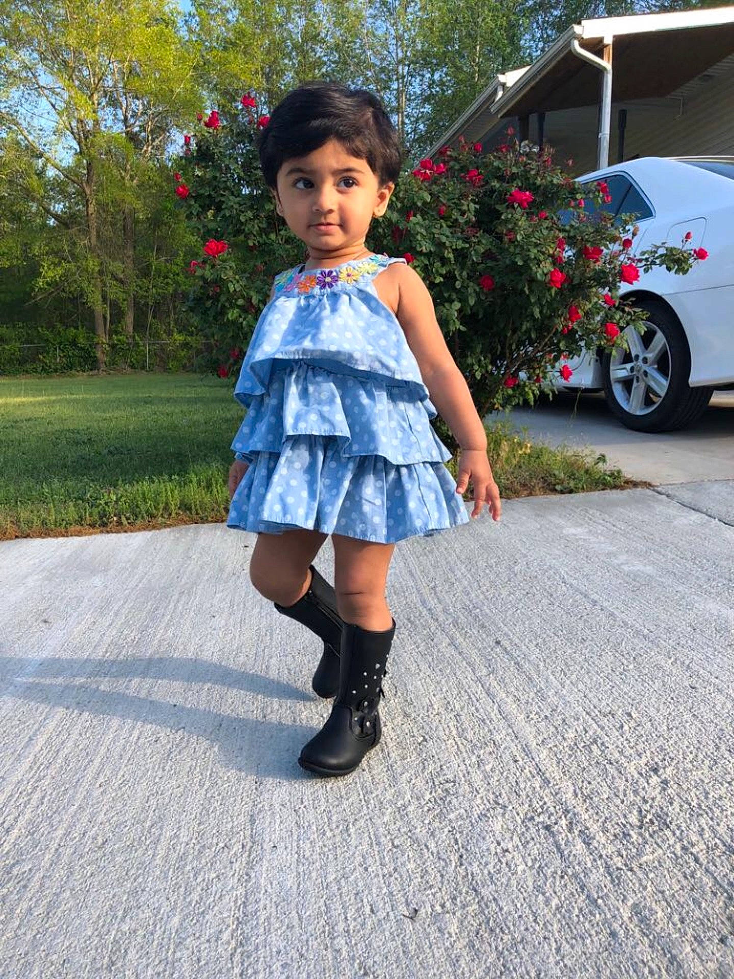 Naira is registered to the contest to win money with this photo: child, clothing, denim, design, dress, footwear, fun, girl, jeans, joint, leg, pattern, person, shoe, shoulder, snapshot, toddler, tree