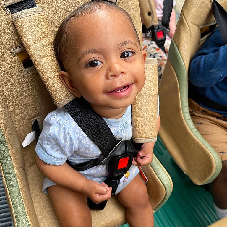 Farenda is registered to the contest to win money with this photo: accessories, baby, belt, bodypart, boy, child, clothing, face, finger, hand, happy, head, male, person, photography, portrait, shorts, smile, strap, transportation