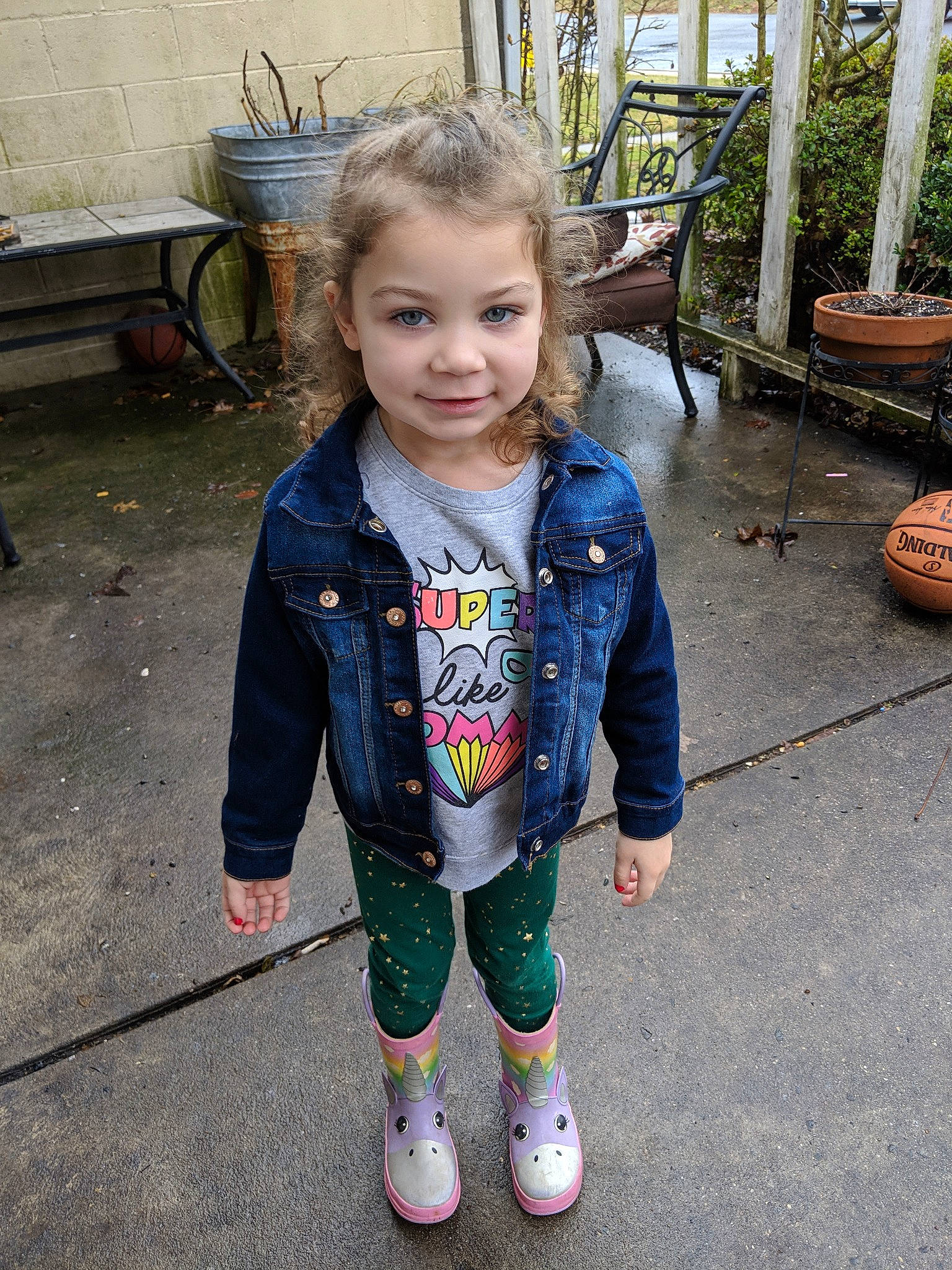 Makena is registered to the contest to win money with this photo: child, child_model, denim, iris, jacket, jeans, joy, outerwear, person, plant, skin, sleeve, smile, standing, t_shirt, textile, toddler, vacation