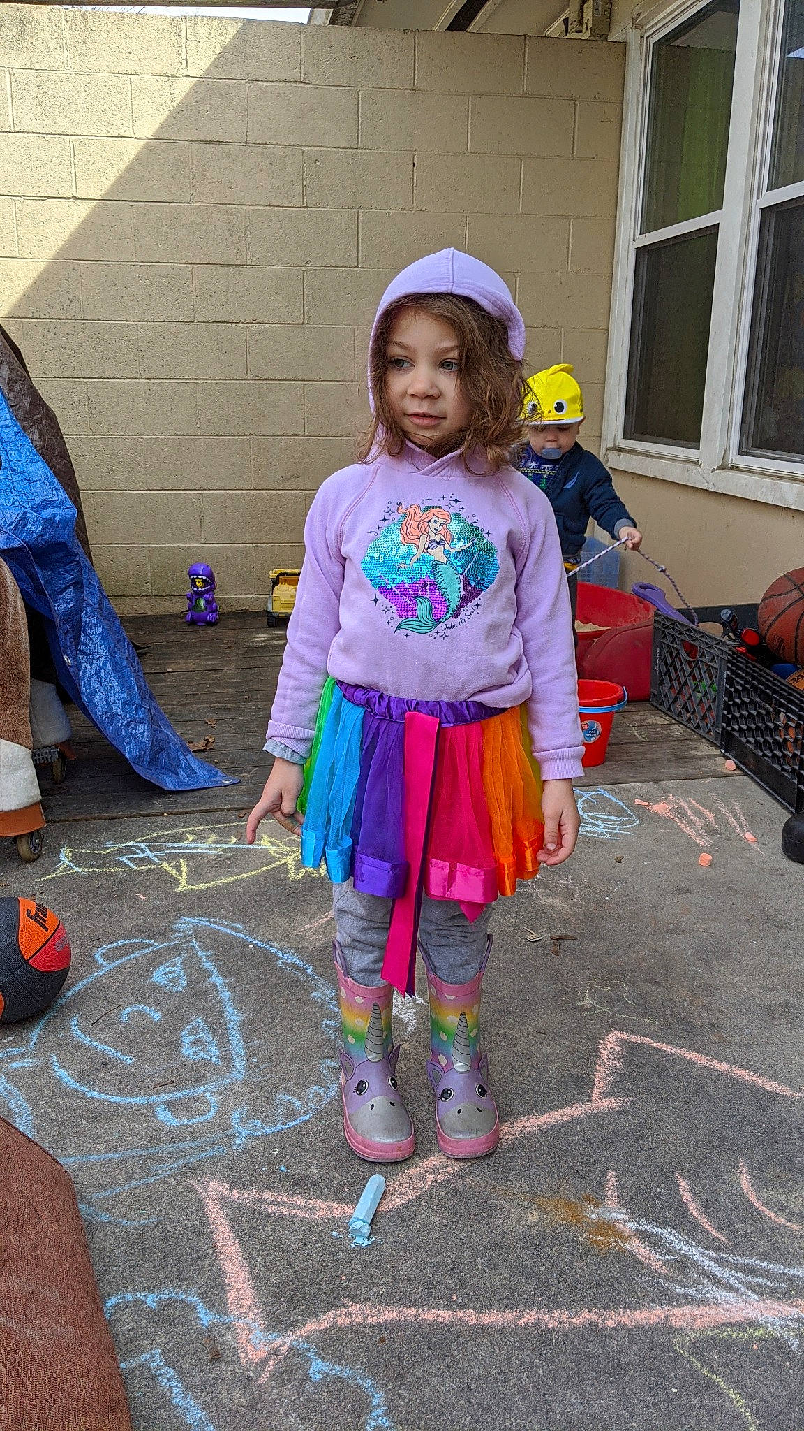 Makena is registered to the contest to win money with this photo: child, costume, footwear, headwear, person, play, purple, toddler, trick_or_treat