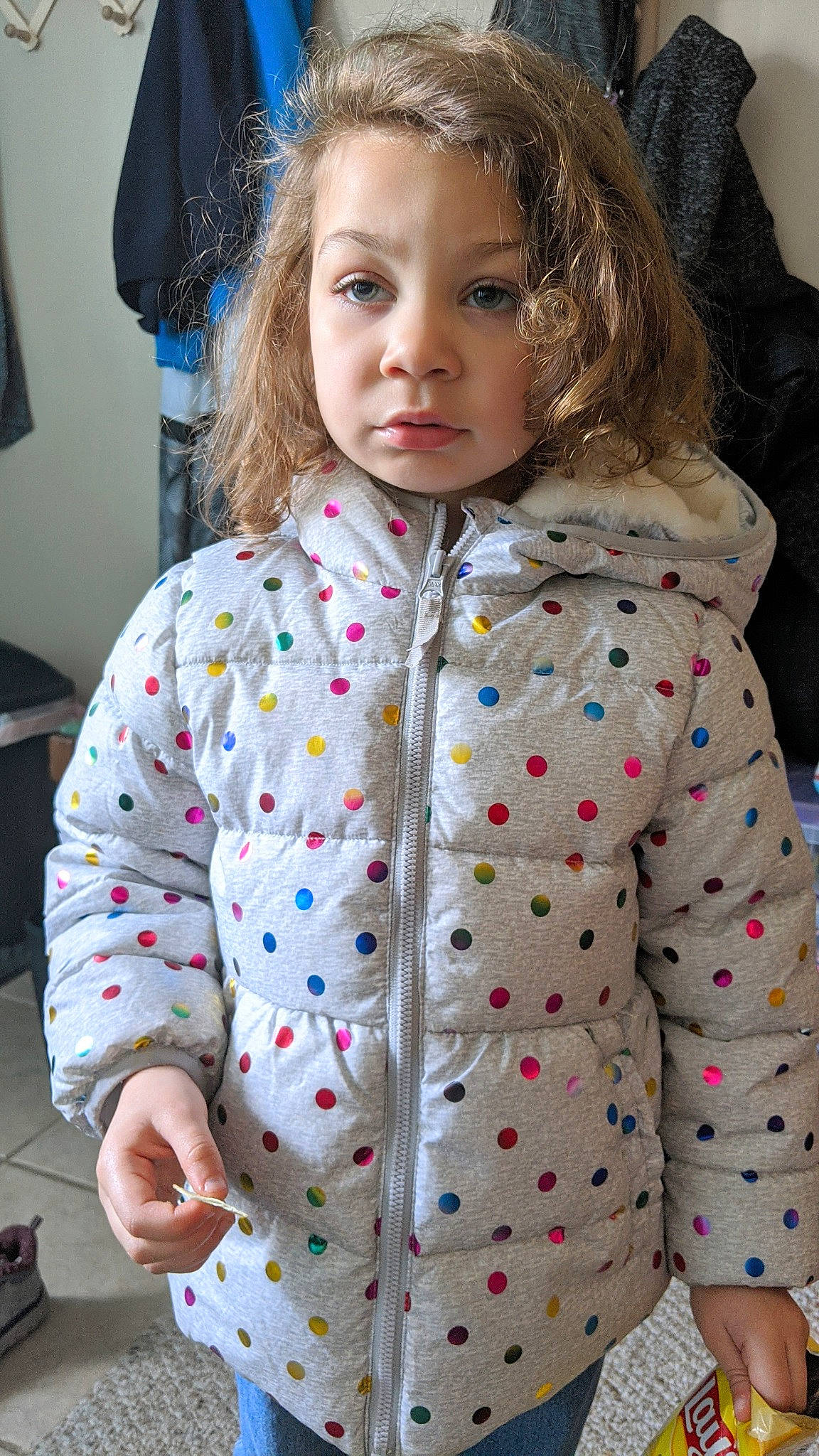 Makena joined the competition — help win amazing prizes! child, child_model, clothing, coat, face, hood, hoodie, jacket, long_hair, outerwear, pattern, person, skin, sleeve, toddler, top