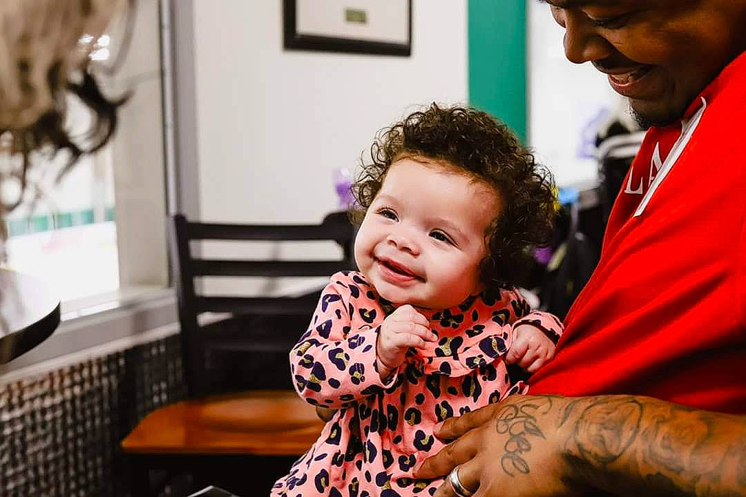 Asa joined the competition — help win amazing prizes! baby, birth, ceremony, child, daughter, event, family, joy, party, people, person, room, skin, smile, toddler, wedding