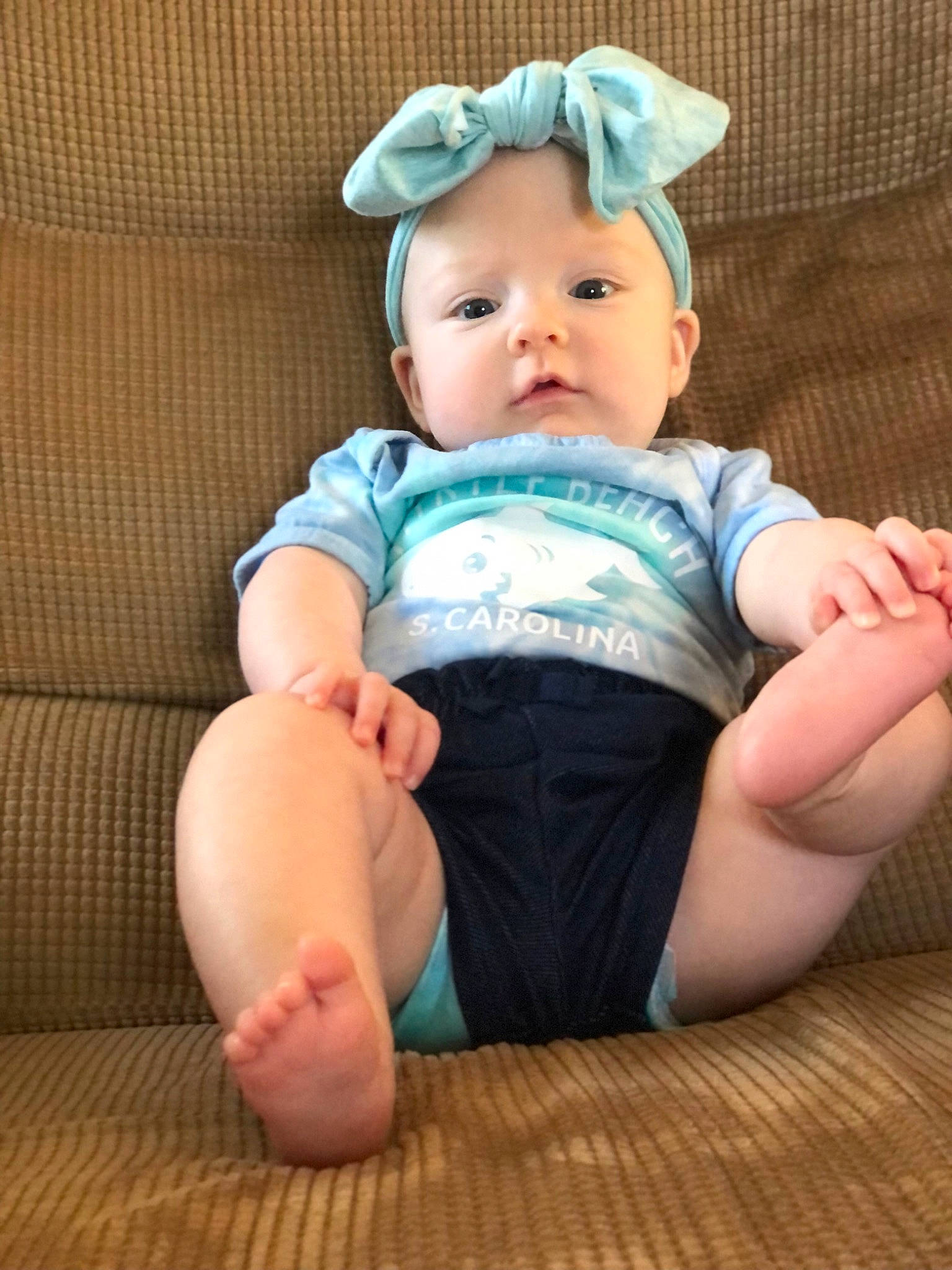 Phoenix joined the competition — help win amazing prizes! baby, baby_toddler_clothing, barefoot, cheek, child, chin, comfort, eye, finger, flooring, foot, head, linens, person, skin, sleeve, sock, thigh, toddler, white