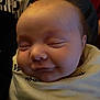 Sutton is registered to the contest to win money with this photo: baby, babylaughing, face, happy, head, laughing, newborn, person, photography, portrait, sleeping, smile