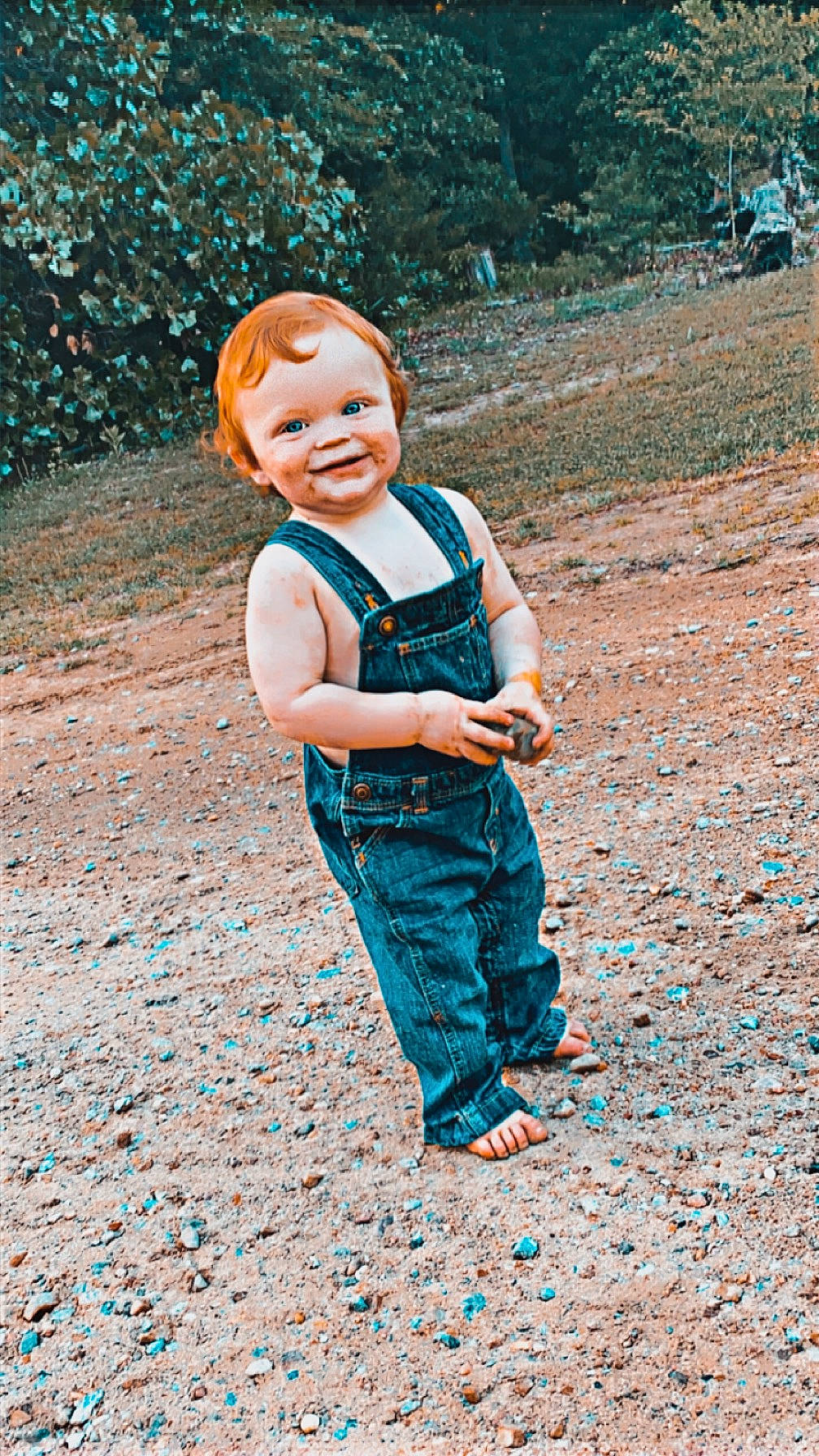 Colton is registered to the contest to win money with this photo: azure, child, denim, electric_blue, flash_photography, fun, grass, happy, joy, landscape, leisure, pattern, people_in_nature, person, play, portrait_photography, recreation, sleeve, smile, soil
