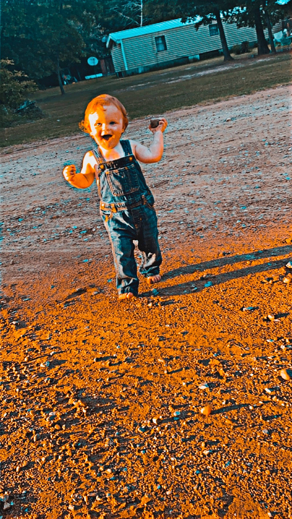 Colton joined the competition — help win amazing prizes! asphalt, child, deciduous, electric_blue, flooring, fun, happy, hat, landscape, leisure, orange, people_in_nature, person, play, recreation, sand, shadow, smile, soil, toddler