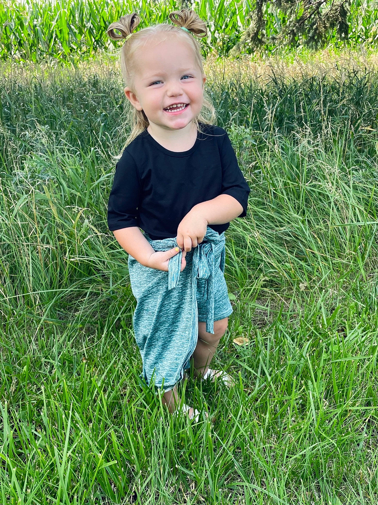 Karley joined the competition — help win amazing prizes! baby_toddler_clothing, barefoot, child, fun, grass, grass_family, grassland, groundcover, happy, joy, lawn, meadow, pattern, people_in_nature, person, plant, prairie, sleeve, smile, summer