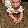 baby, carpet, child, crawling, cute, expression, face, hands, happy, head, indoor, infant, onesie, pattern, person, skin, smile, soft, texture, young