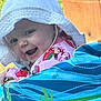 Winter joined the competition — help win amazing prizes! baby, blanket, blue_blanket, child, closeup, cute, face, grass, green_pattern, happy, hat, infant, joyful, outdoor, pink_clothing, portrait, smiling, strawberry_pattern, sunlight, white_hat
