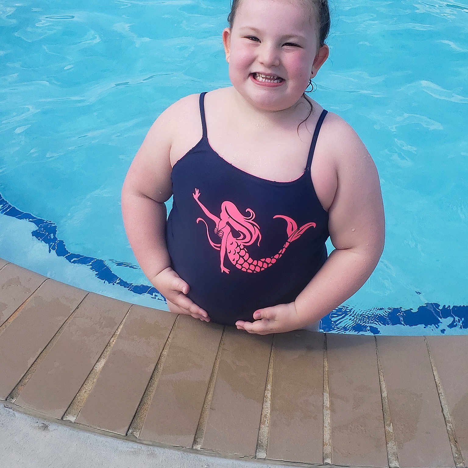 Lanie is registered to the contest to win money with this photo: fun, joy, leisure, person, recreation, summer, swimming_pool, vacation