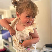 Alayah joined the competition — help win amazing prizes! toddler, child, smiling, crochet_dress, fruit_patches, indoor, blurry_background, happy, cute, playful, hair_ponytail, earring, skin, face, person, clothing, young_child, portrait, motion, bright