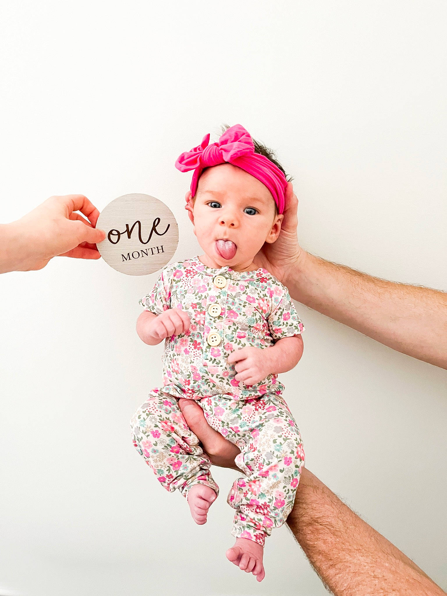 Taytum joined the competition — help win amazing prizes! baby, baby_toddler_clothing, cap, child, elbow, face, fashion_accessory, flash_photography, font, gesture, happy, headwear, magenta, pattern, person, pink, product, sleeve, t_shirt, toddler