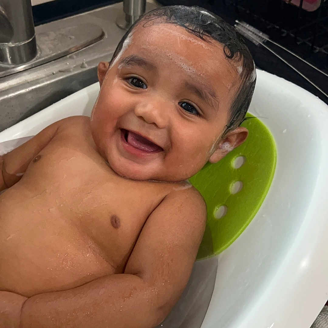 Lucchese joined the competition — help win amazing prizes! baby, bathing, bathroom, bathtub, face, happy, head, indoors, person, photography, plant, portrait, pottedplant, room, sink, sinkfaucet, smile, summer, tub, washing