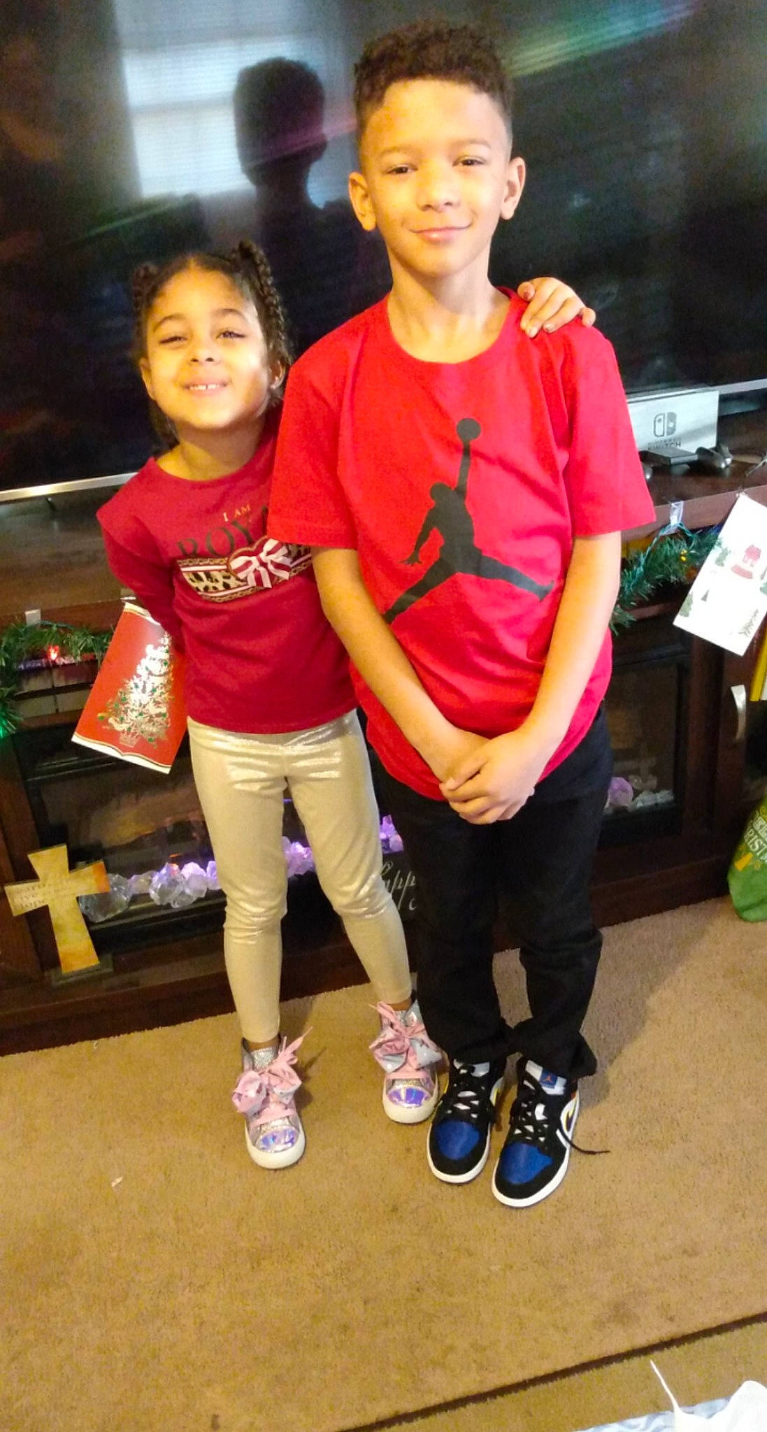 Xavier is registered to the contest to win money with this photo: child, footwear, joy, person, shoe, smile, t_shirt