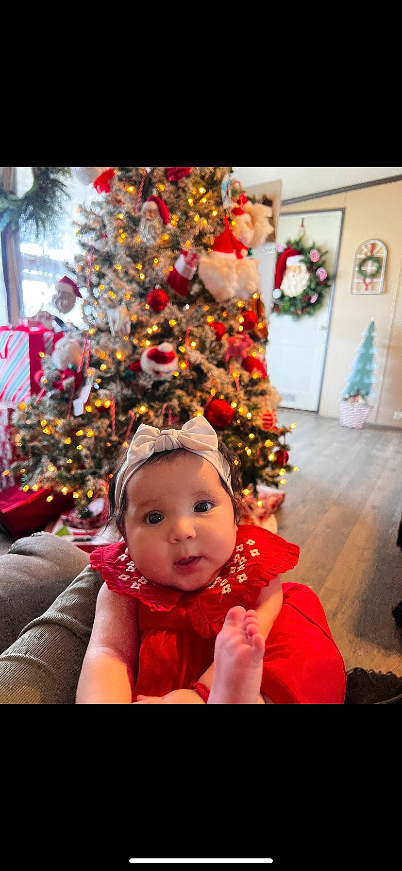 Rosalia joined the competition — help win amazing prizes! baby, baby_toddler_clothing, child, christmas, christmas_decoration, christmas_eve, christmas_ornament, christmas_tree, conifer, costume_hat, event, fun, happy, headwear, holiday, holiday_ornament, ornament, person, plant, toddler