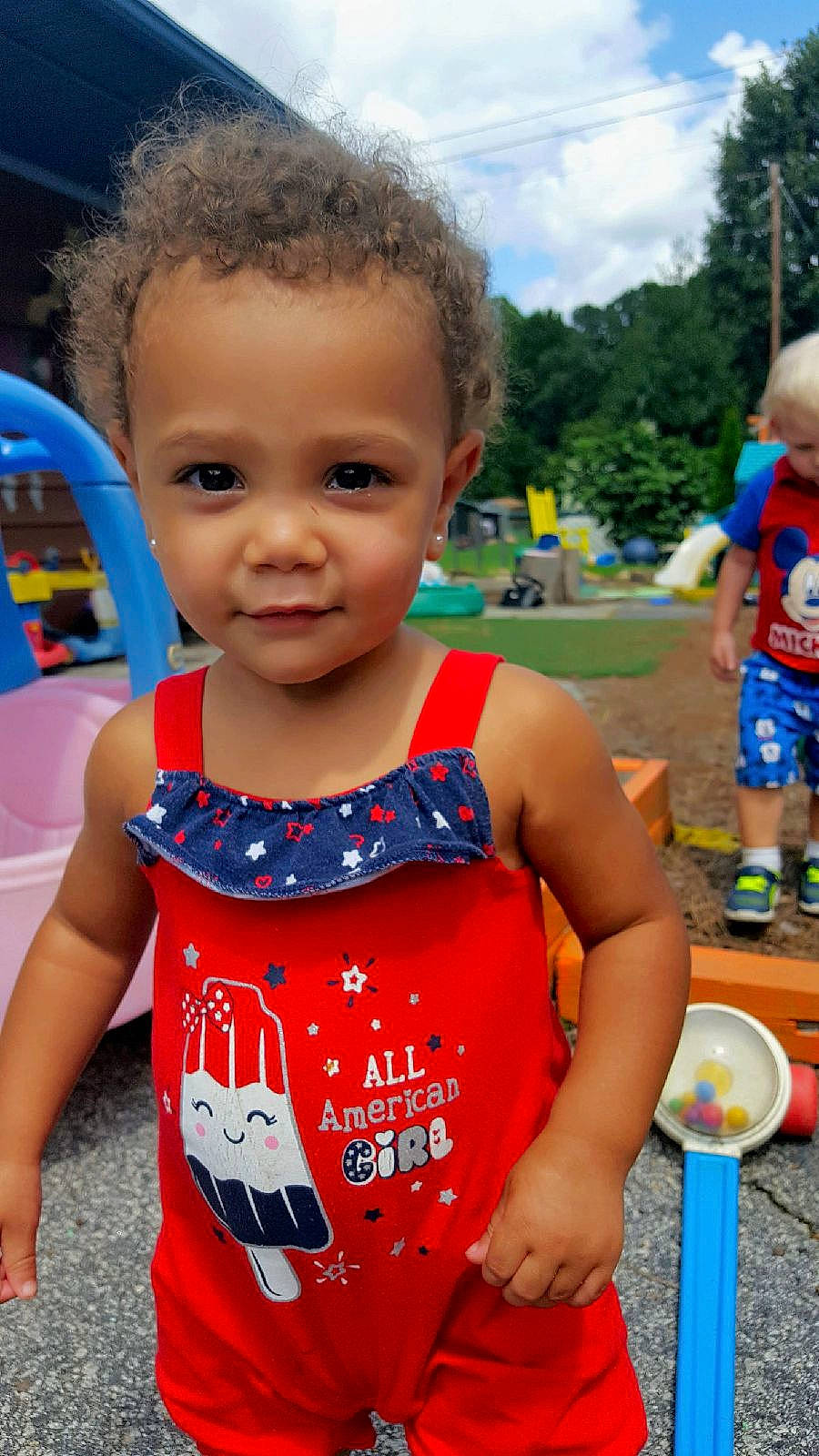 Keira is registered to the contest to win money with this photo: child, day, endurance_sports, fun, girl, person, play, product, race, recreation, red, smile, summer, toddler, vacation