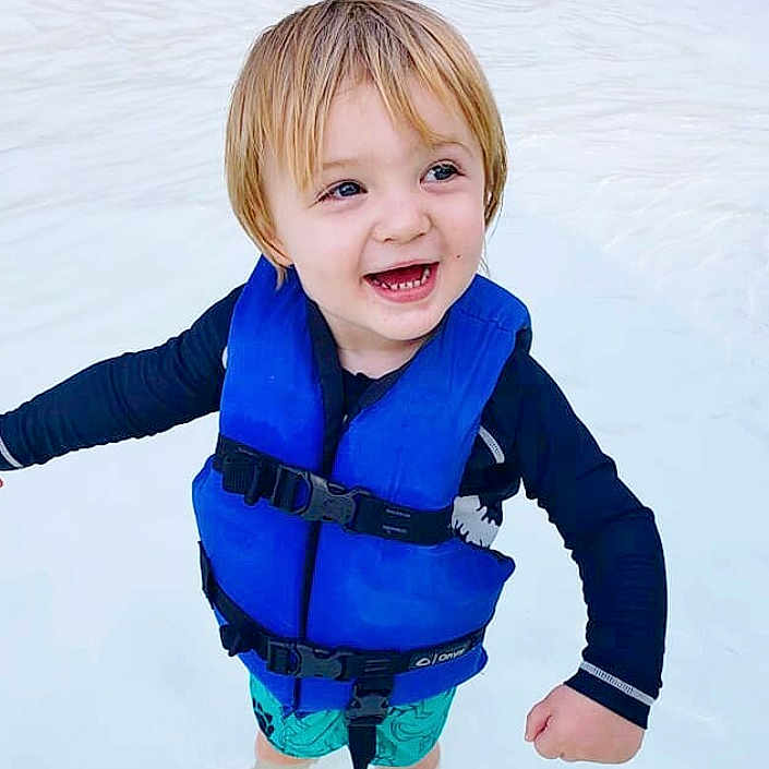 Orion is registered to the contest to win money with this photo: blue, boy, child, electric_blue, fun, material, neck, outerwear, person, sleeve, smile, toddler, winter