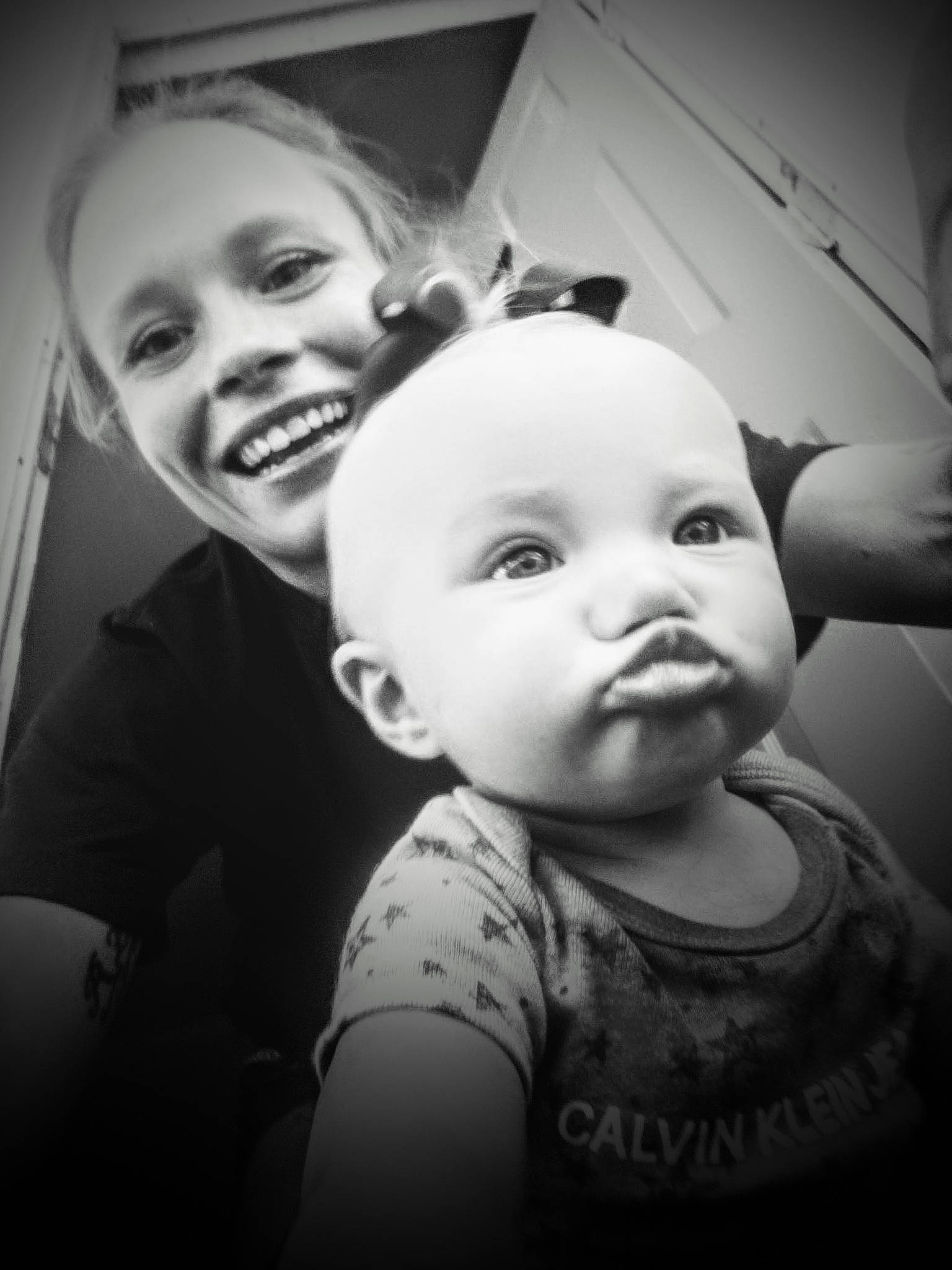 Mallorie joined the competition — help win amazing prizes! baby, black_and_white, cheek, chin, ear, eyebrow, eyelash, flash_photography, fun, gesture, happy, iris, jaw, joy, mouth, nose, person, skin, smile, style