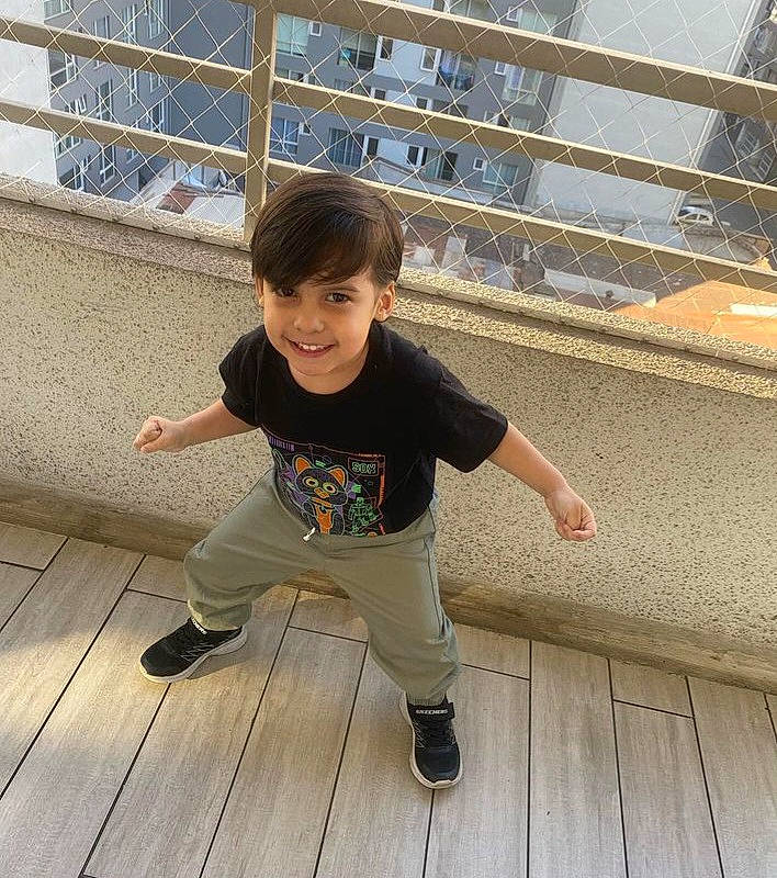 Jesus joined the competition — help win amazing prizes! baby_toddler_clothing, child, composite_material, face, fence, flooring, fun, happy, hardwood, joy, leisure, person, sitting, skin, sky, sleeve, smile, toddler, travel, tree