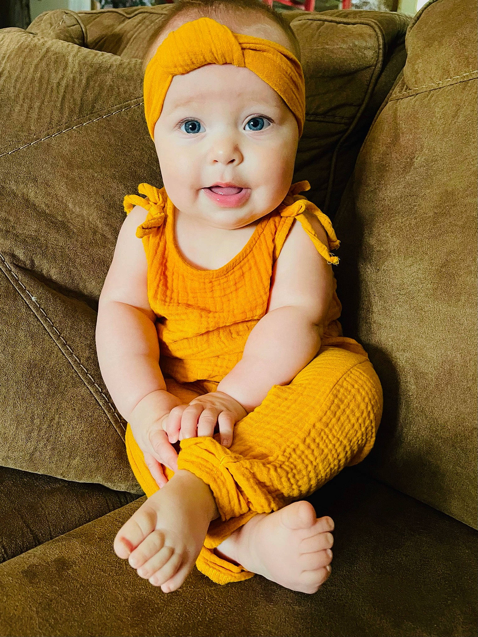 Callie joined the competition — help win amazing prizes! baby, baby_toddler_clothing, cap, cheek, child, comfort, cool, eye, face, facial_expression, fun, grass, green, hand, head, headwear, person, skin, sleeve, textile