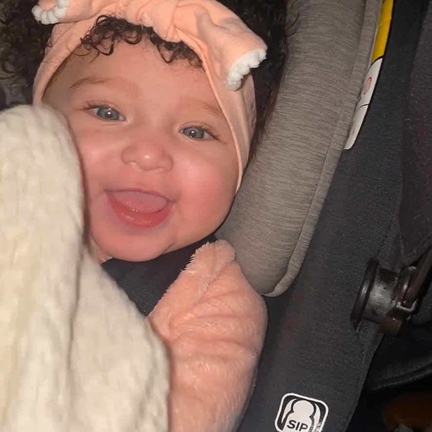 Milan joined the competition — help win amazing prizes! baby, babylaughing, blanket, bodypart, bonnet, cap, clothing, cushion, face, happy, hat, head, homedecor, hood, laughing, newborn, person, photography, portrait, smile