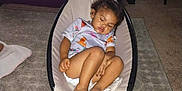 Ocean joined the competition — help win amazing prizes! toddler, sleeping, baby_rocker, indoor, living_room, carpet, television, child, foot, clothing, fan, blanket, relaxation, cute, comfort, nap, furniture, person, home, quiet