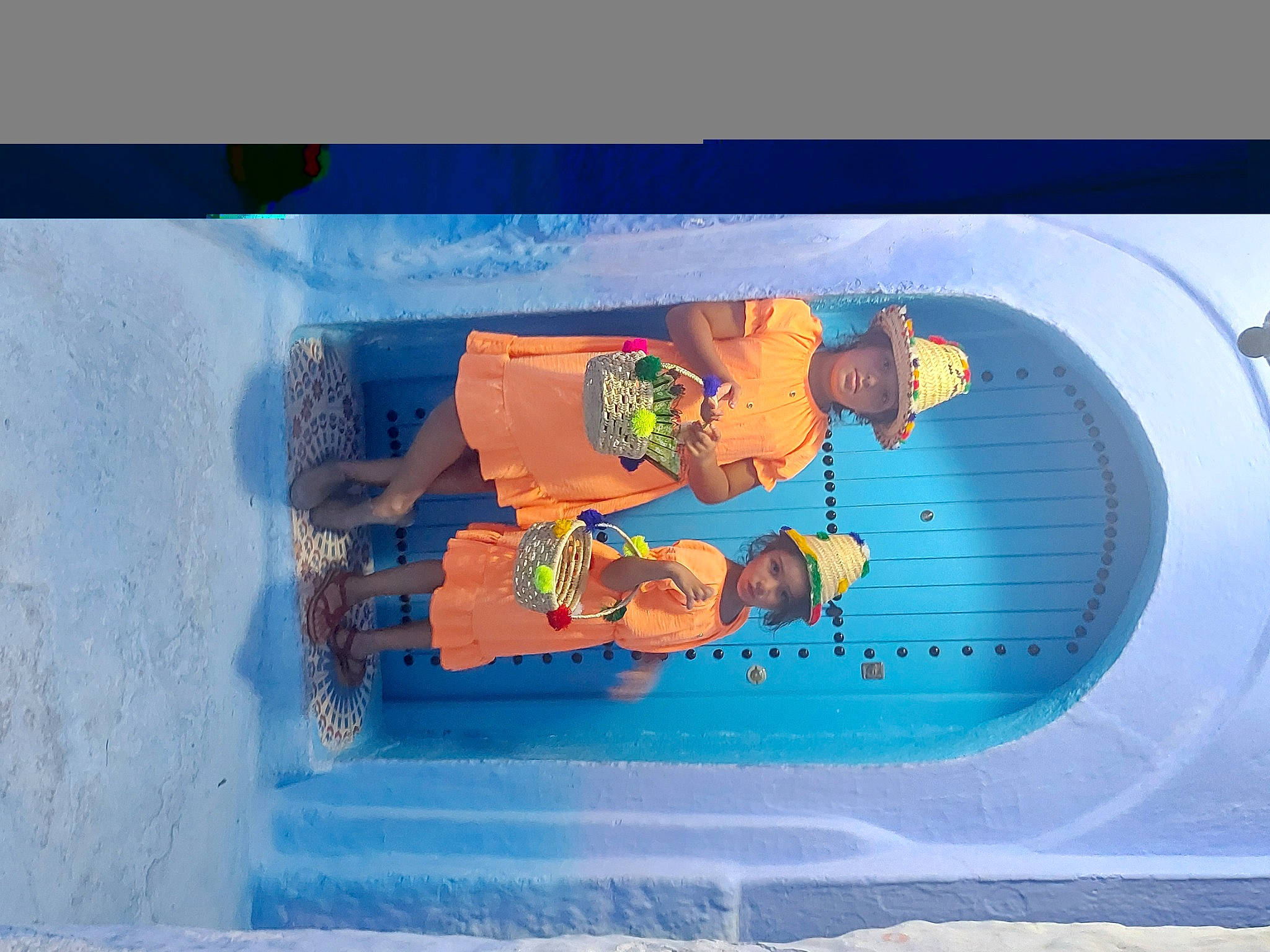 Lina participe au concours pour gagner de l'argent avec cette photo : art, automotive_exterior, azure, electric_blue, facade, fun, headwear, hood, leisure, mural, person, rectangle, tints_and_shades, toddler, trunk, vehicle_door, visual_arts, water, world