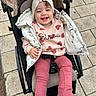 bisou, child, cute, hand, happy, headband, hearts, jacket, leggings, outdoor, pavement, pink, portrait, seatbelt, shoe, smile, stroller, sweater, teeth, toddler