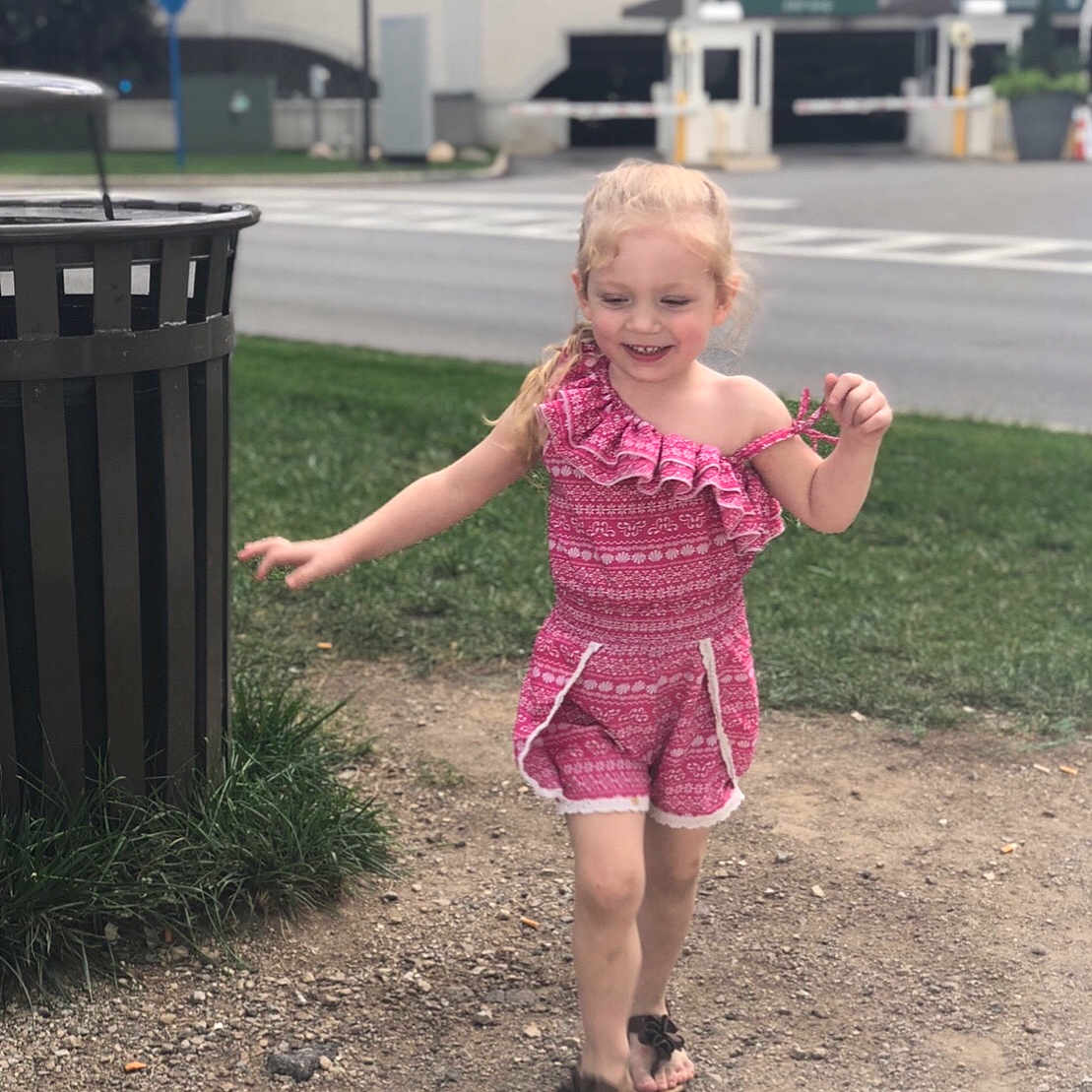 Elayna joined the competition — help win amazing prizes! child, dress, fun, joy, person, pink, play, public_space, smile, snapshot, standing, summer, toddler, vacation, walking