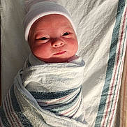 Oliviajane joined the competition — help win amazing prizes! newborn, baby, infant, wrapped, blanket, striped_blanket, hat, cute, face, lying_down, hospital, fresh, skin, eyes_open, smile, soft_light, portrait, child, swaddle, indoors