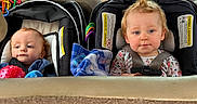 Dale joined the competition — help win amazing prizes! baby, car_seat, infant, child, vehicle_interior, toy, blanket, seatbelt, car, dashboard, steering_wheel, headrest, clothing, safety, cute, face, blue_eyes, hair, seat, interior